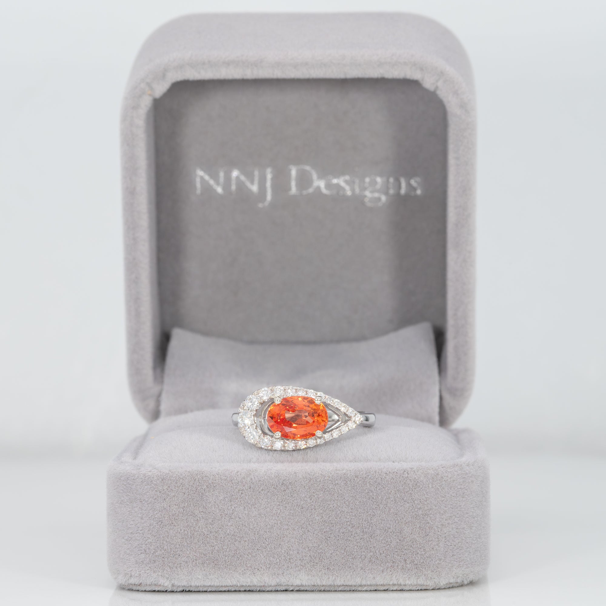 14K white gold padparadscha sapphire ring with diamond accents