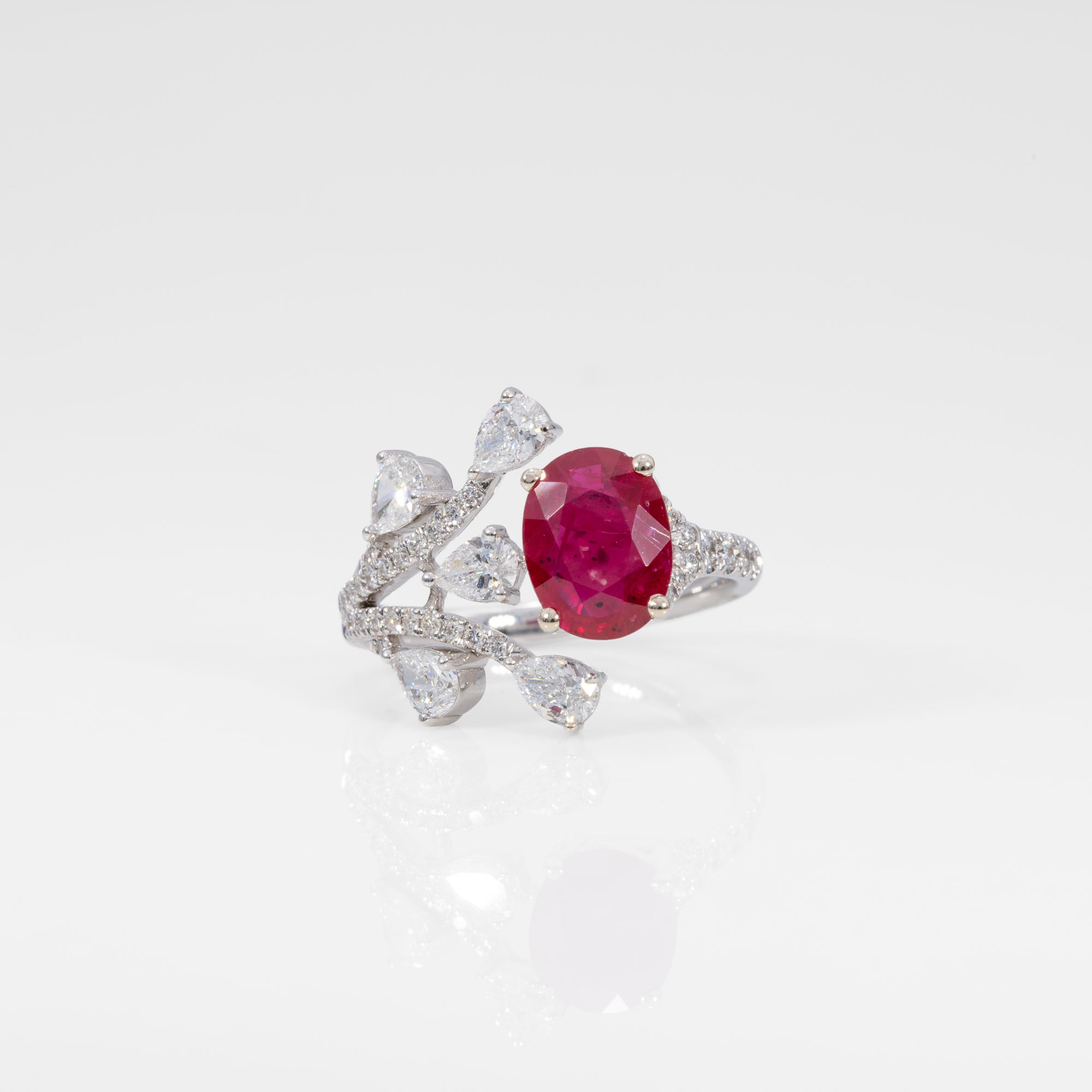 14K white gold mozambique ruby ring with diamond accents