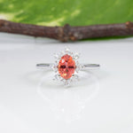 14K white gold padparadscha sapphire ring with diamond accents