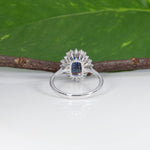 14K white and rose gold tanzanite ring with diamond accents