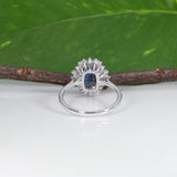 14K white and rose gold tanzanite ring with diamond accents