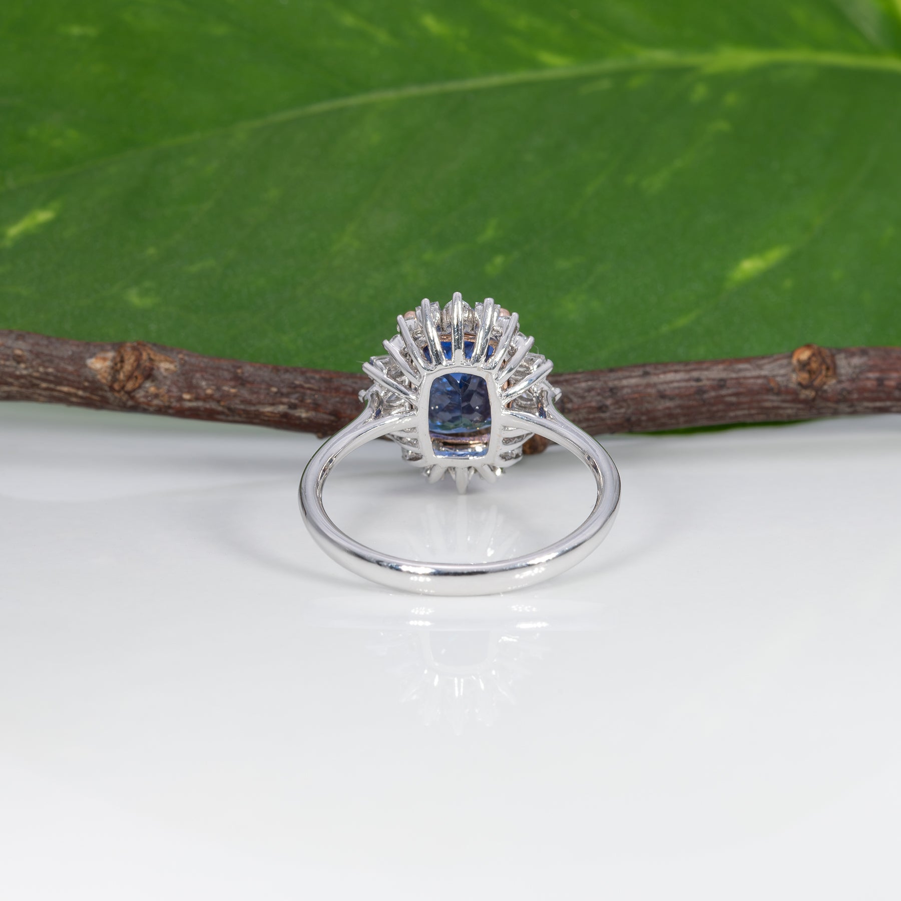 14K white and rose gold tanzanite ring with diamond accents