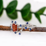 Varsha 14K Solid White Gold Orange Sapphire and Blue Sapphire Ring | EM 6x4mm