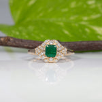 14K yellow gold Colombian emerald ring with diamond accents