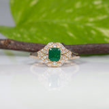 14K yellow gold Colombian emerald ring with diamond accents