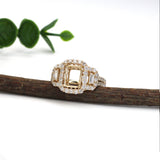 Celeste Collection Two Baguette Baskets & a Center Emerald Basket w a Diamond Halo