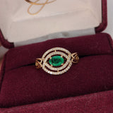 Celtic Inspired East West Emerald and Diamond Ring