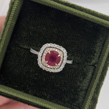 Statement Ruby Ring with a Double Halo of Diamonds