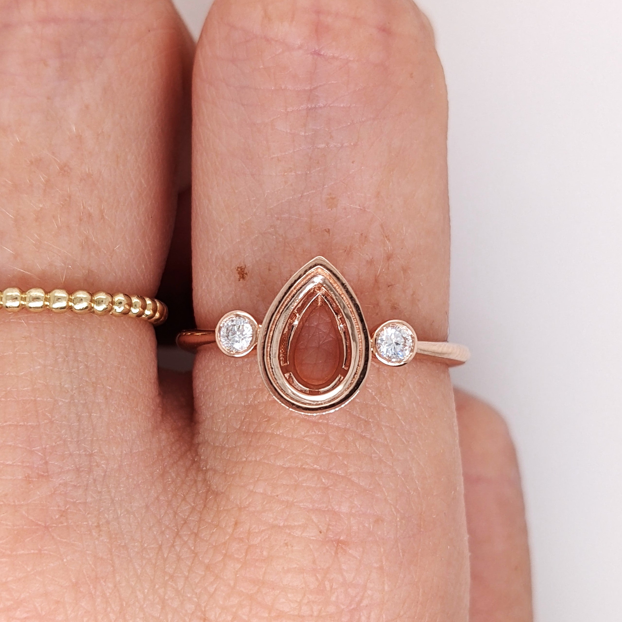Three Stone Bezel Set Ring w Bezel Set Round Natural Diamond Accents in 14k Gold | Pear Cut