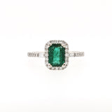 Beautiful Emerald Ring with a Halo of Diamonds