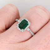 Beautiful Emerald Ring with a Halo of Diamonds