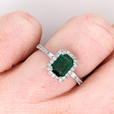 Beautiful Emerald Ring with a Halo of Diamonds