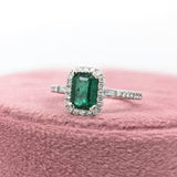 Beautiful Emerald Ring with a Halo of Diamonds
