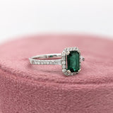 Beautiful Emerald Ring with a Halo of Diamonds