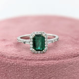 Beautiful Emerald Ring with a Halo of Diamonds