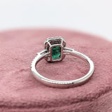 Beautiful Emerald Ring with a Halo of Diamonds