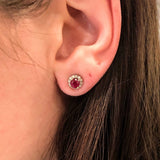 Pretty Round Ruby Studs with Diamond Halo