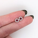Pretty Round Ruby Studs with Diamond Halo