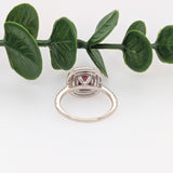 Statement Ruby Ring with a Double Halo of Diamonds