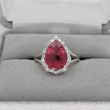 Pear Shaped Pink Tourmaline W a Mixed Baguette and Round Diamond Halo Ring in 14K White Gold | Pear
