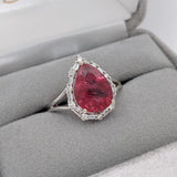 Pear Shaped Pink Tourmaline W a Mixed Baguette and Round Diamond Halo Ring in 14K White Gold | Pear