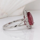 Pear Shaped Pink Tourmaline W a Mixed Baguette and Round Diamond Halo Ring in 14K White Gold | Pear