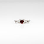 14K white gold red spinel ring with diamond accents
