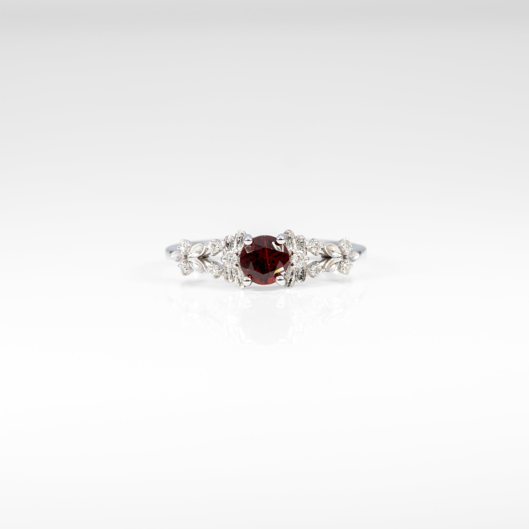 14K white gold red spinel ring with diamond accents