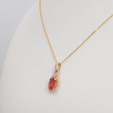 14K yellow gold padparadscha sapphire pendant