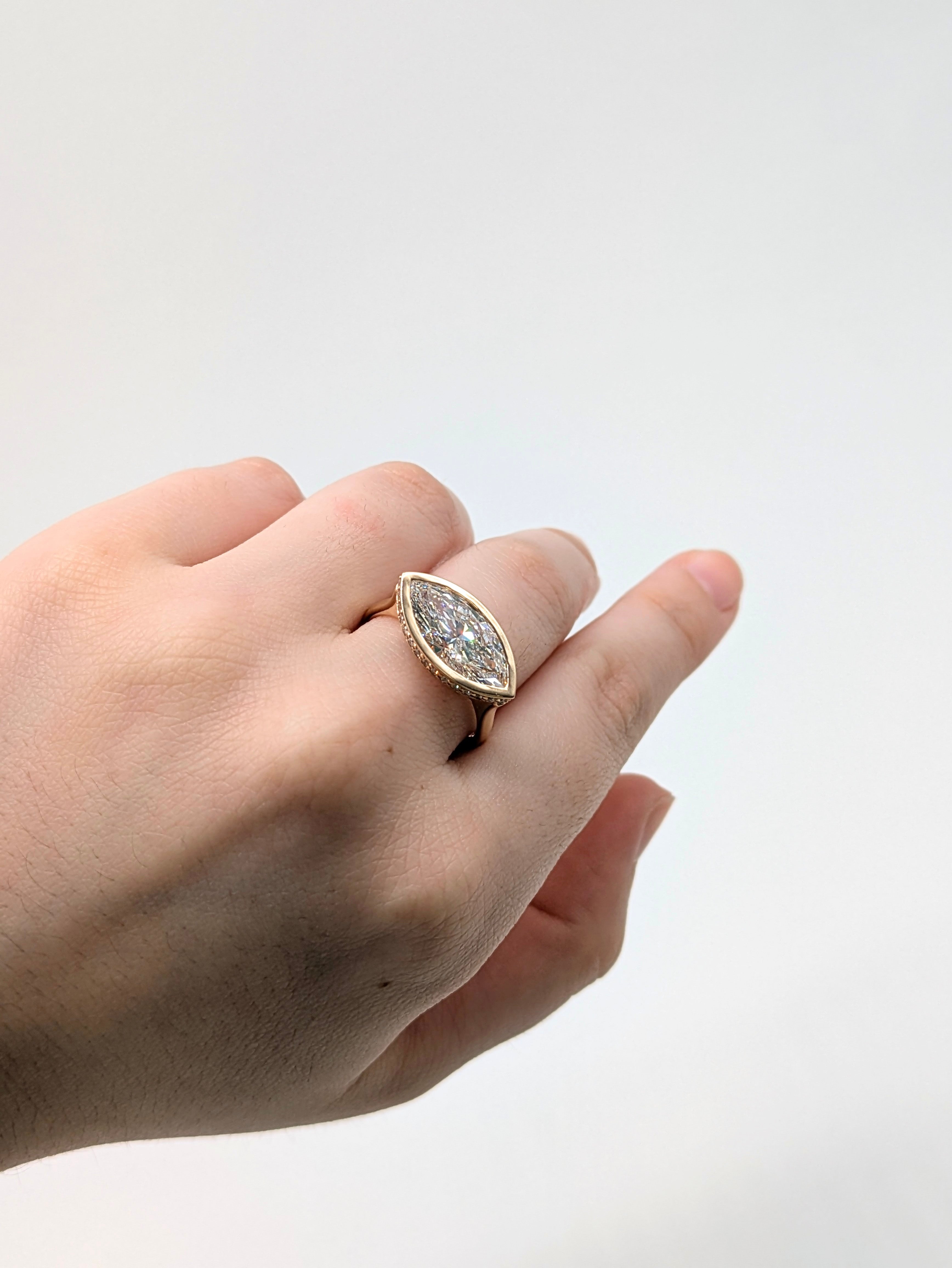 14K yellow gold marquise lab grown diamond ring with diamond accents