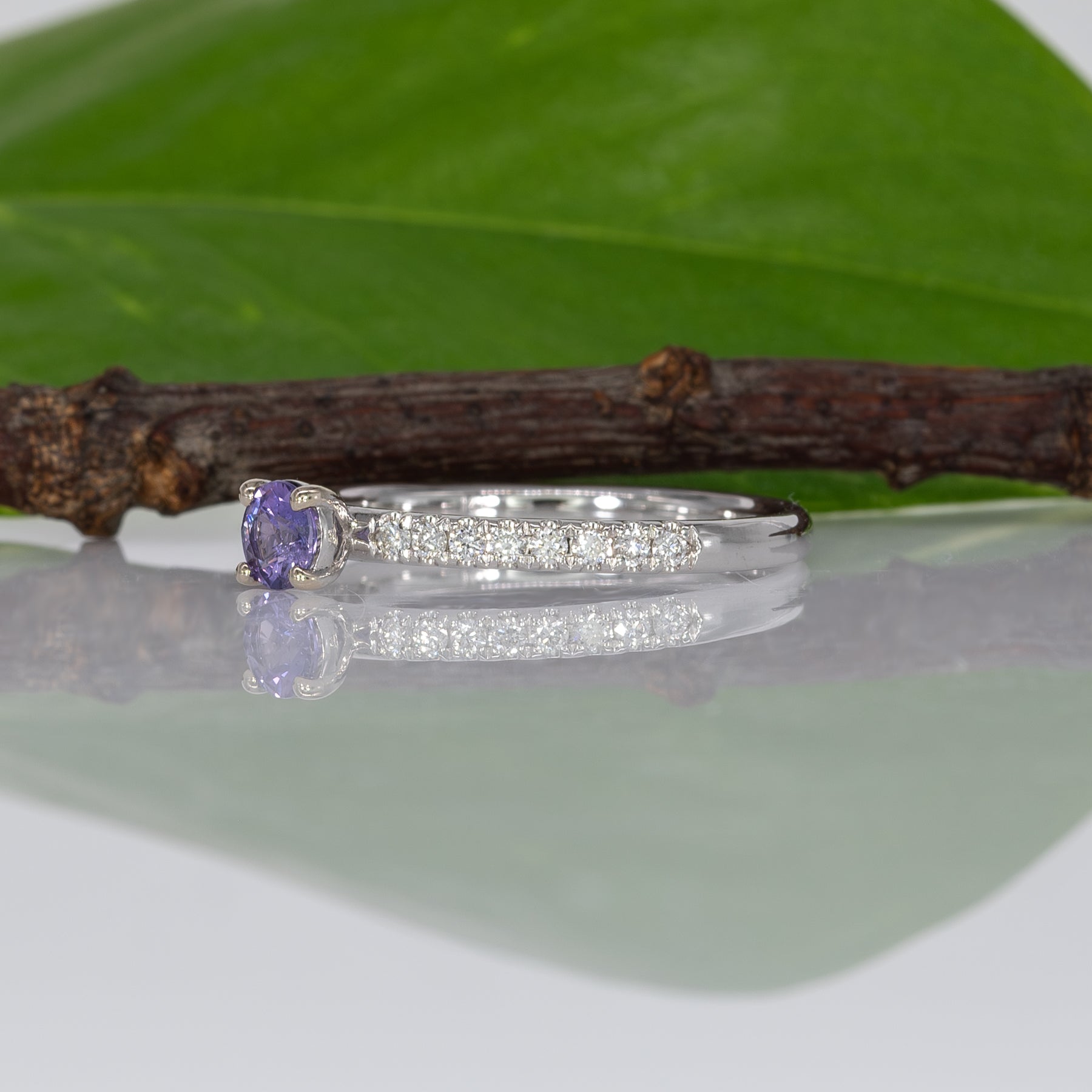 14K white gold purple sapphire round ring with diamond halo