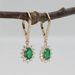 Zambian Emerald Dangle Earrings in 14K Yellow Gold | Diamond Halo | Oval Cut | 6x4mm | May Birthstone