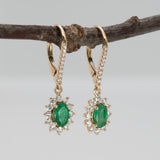 Zambian Emerald Dangle Earrings in 14K Yellow Gold | Diamond Halo | Oval Cut | 6x4mm | May Birthstone