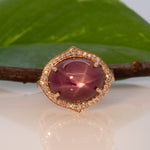14K rose gold star ruby cabochon ring with diamond halo