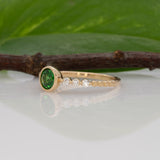 14K yellow gold tsavorite garnet round ring with diamond accents