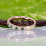 14K yellow gold diamond and emerald band ring