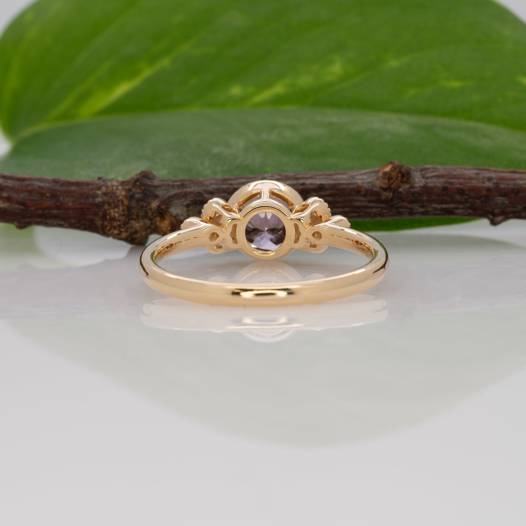 14K yellow gold purple spinel round ring with diamond accents