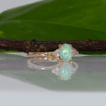 14K yellow gold Ethiopian opal cabochon ring with diamond accents