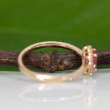 14K yellow gold padparadscha sapphire ring with diamond accents