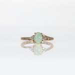 14K yellow gold Ethiopian opal cabochon ring with diamond accents