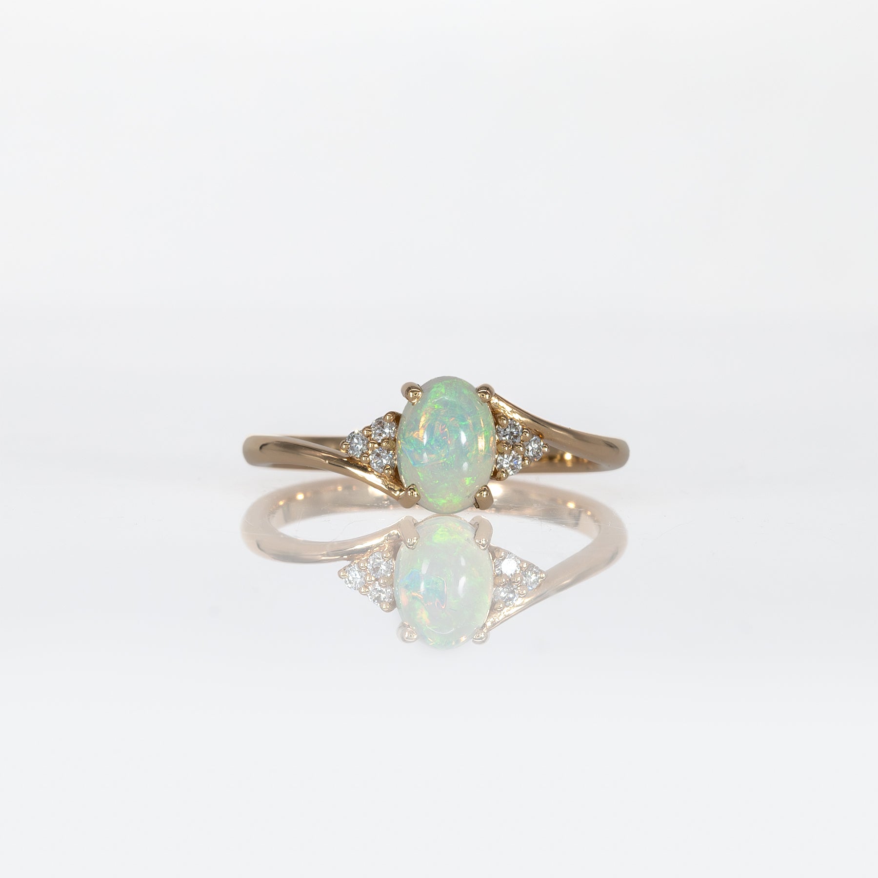 14K yellow gold Ethiopian opal cabochon ring with diamond accents