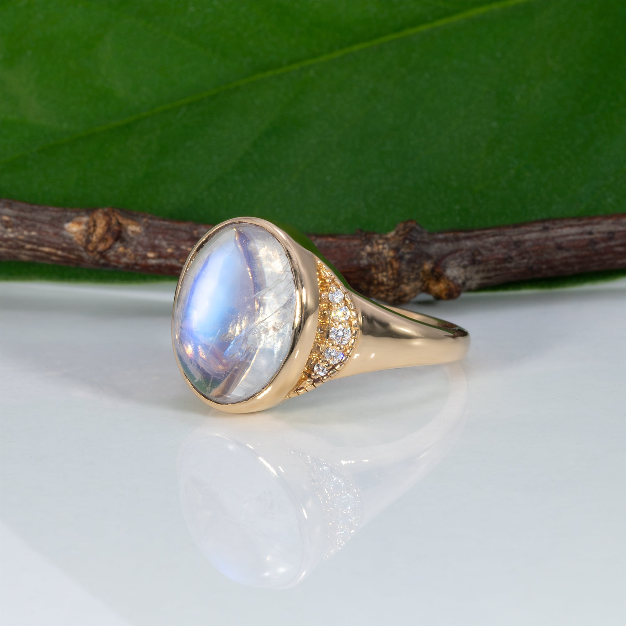 14K yellow gold rainbow moonstone cabochon ring with diamonds