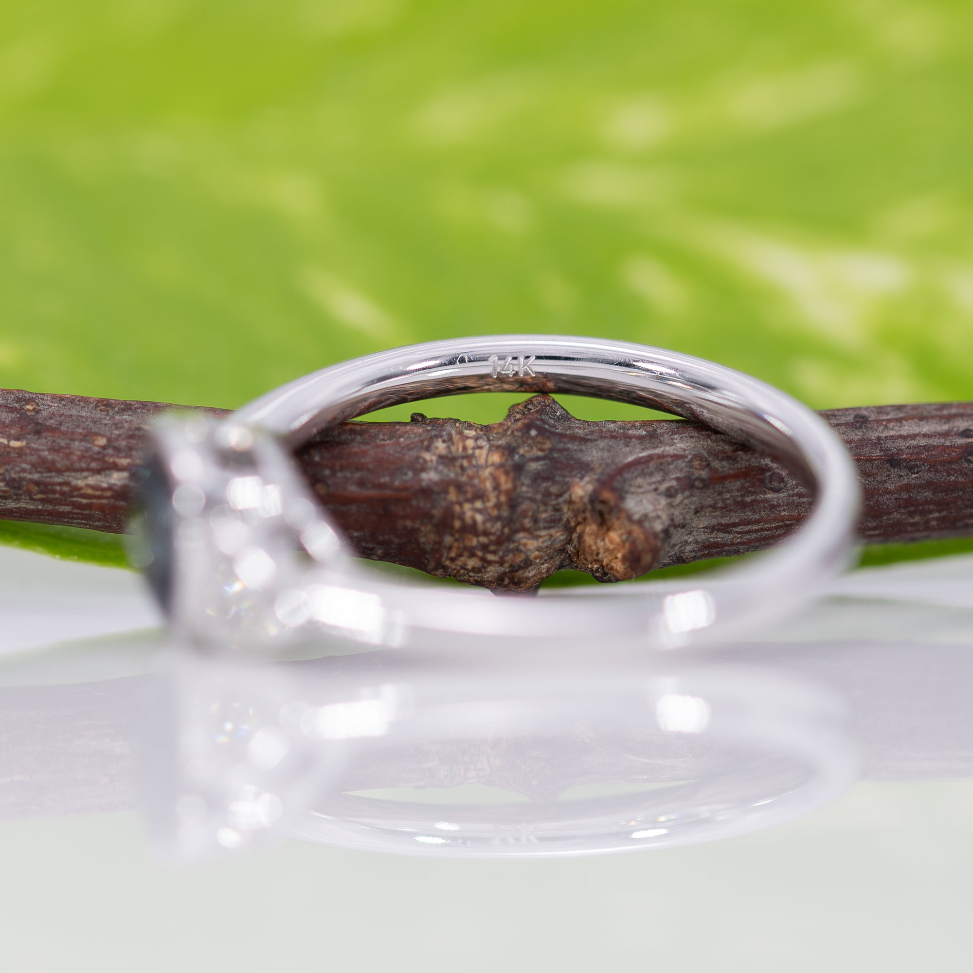 14K white gold blue spinel ring with diamond accents