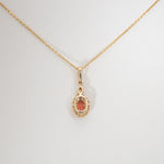 14K yellow gold padparadscha sapphire pendant
