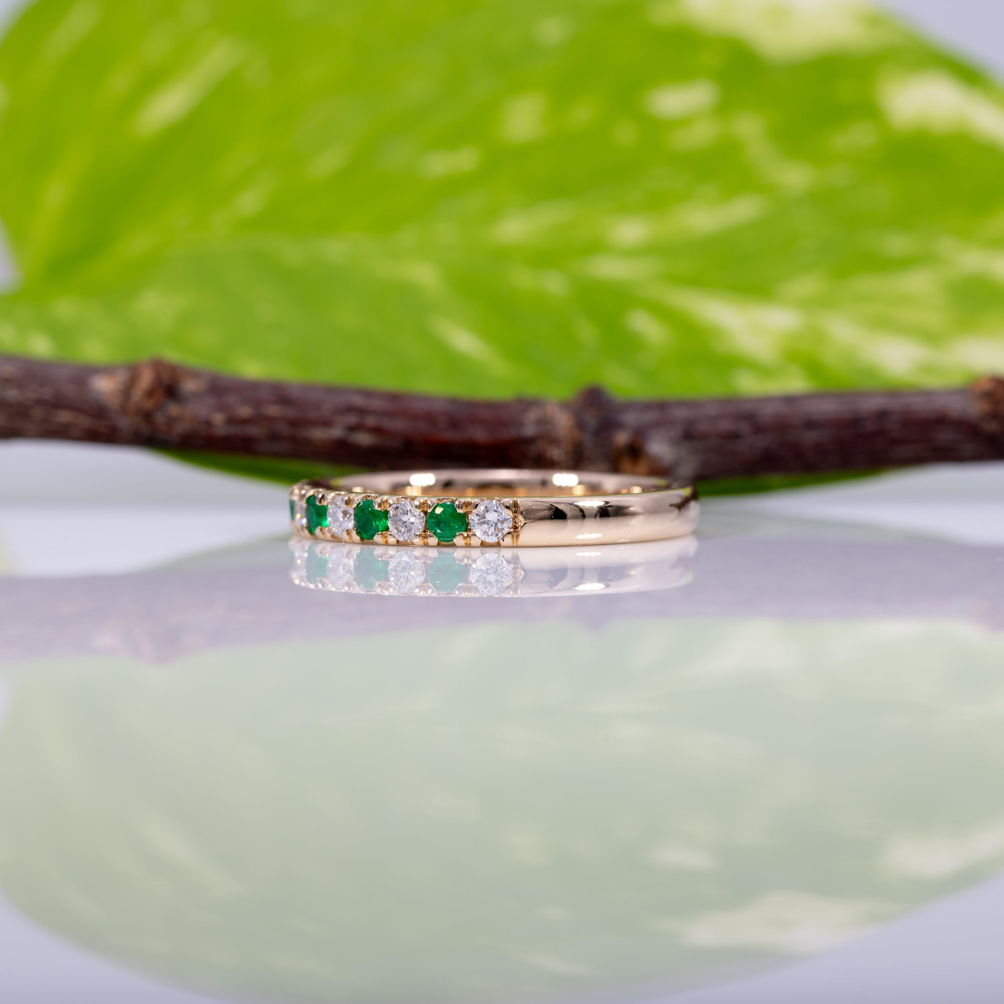 14K yellow gold diamond and emerald band ring