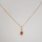 14K yellow gold padparadscha sapphire pendant