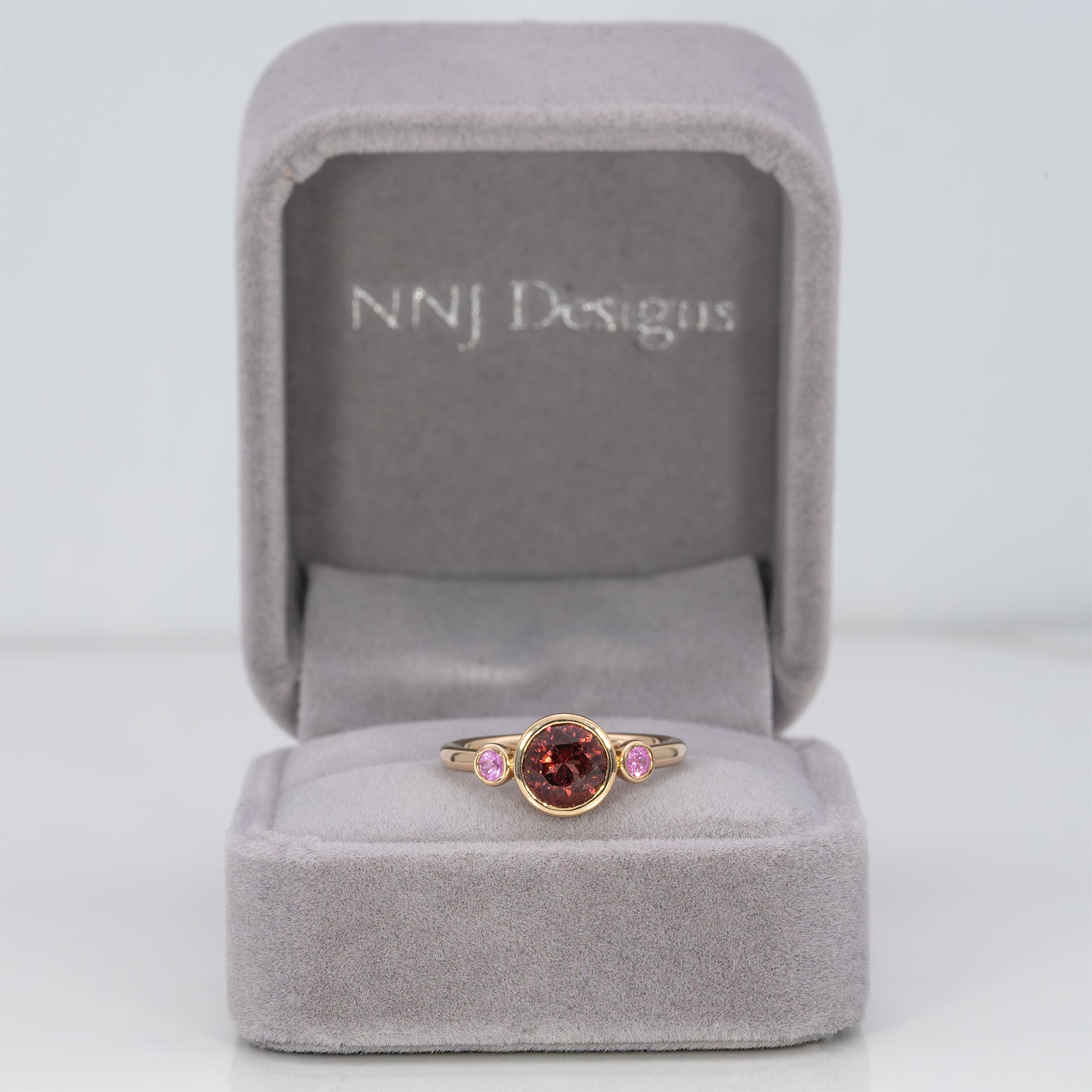 14K yellow gold red spinel ring with pink sapphire accents