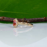 14K yellow gold padparadscha sapphire ring with diamond accents