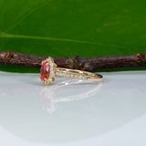 14K yellow gold padparadscha sapphire ring with diamond accents