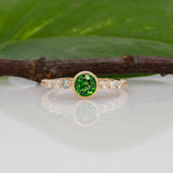 14K yellow gold tsavorite garnet round ring with diamond accents